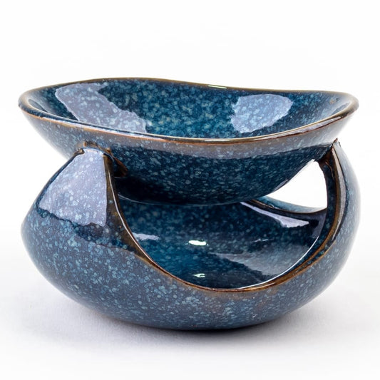 El Quemador de Cera Fleur-de-Bois Cerámica de Lujo - Esmeralda Nocturna en gris y azul efecto granito tiene base circular abierta y cuenco superior, aportando elegancia a cualquier espacio. Presentado sobre fondo blanco.