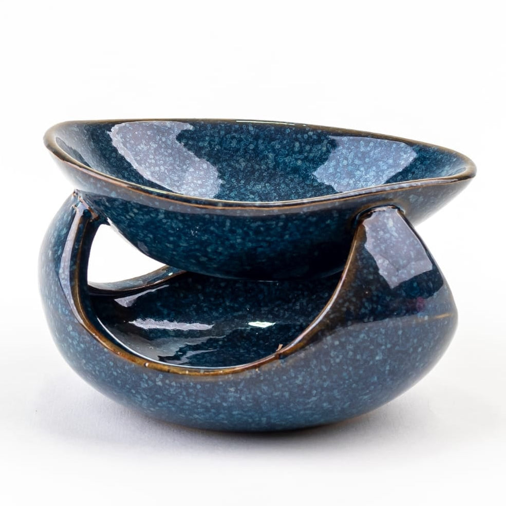 El Quemador de Cera Fundida Cerámica de Lujo Fleur-de-Bois - Esmeralda Nocturna presenta un diseño gris y azul efecto granito, con cuenco profundo superior y espacio inferior para velita candelita. Se muestra sobre fondo blanco.